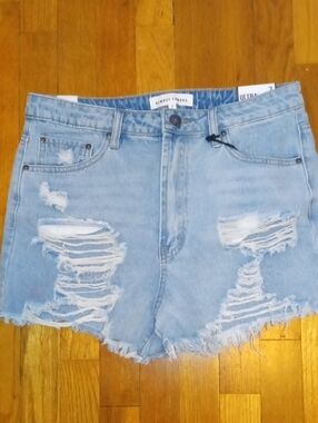 NWT size 7 Almost Famous Light Blue Distressed Denim Shorts, high rise